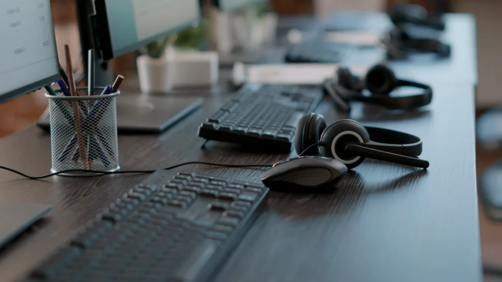 headset-and-keyboard-office-desk